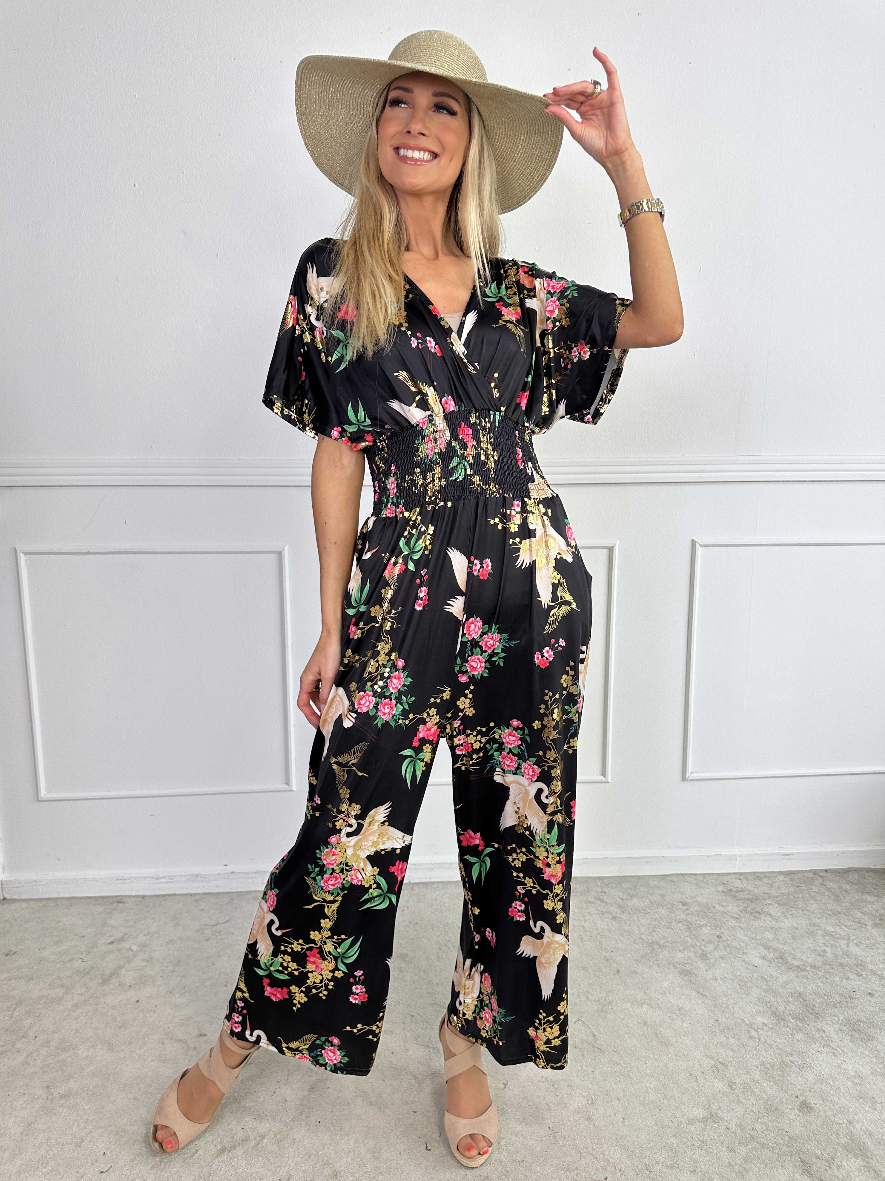 Pams Fly Jumpsuit - Elastisk buksedragt med blomster- og fugleprint